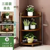 Puesto de flores marrón de tres niveles