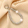 White Zircon Ring + 2 Pearls