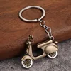 Coche de batería de bronce antiguo