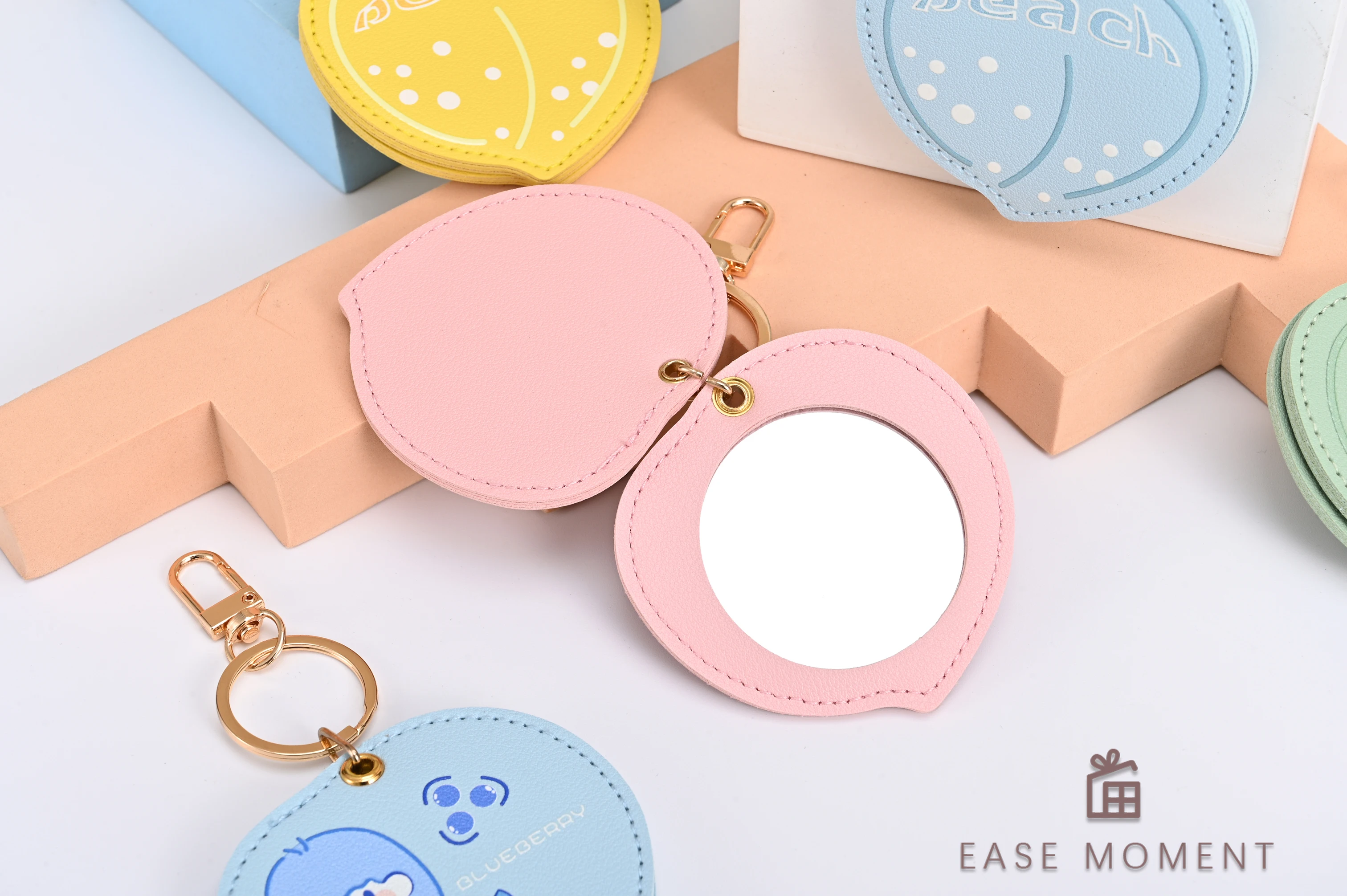 Newly Launched Gold Keychain Multi-color Leather case with Peach Shaped Cute Birthday Gift Hanging Bag and Makeup Mirror (1PC)