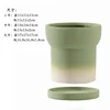 Verde oliva sfumato con bordo largo e arrotondato.