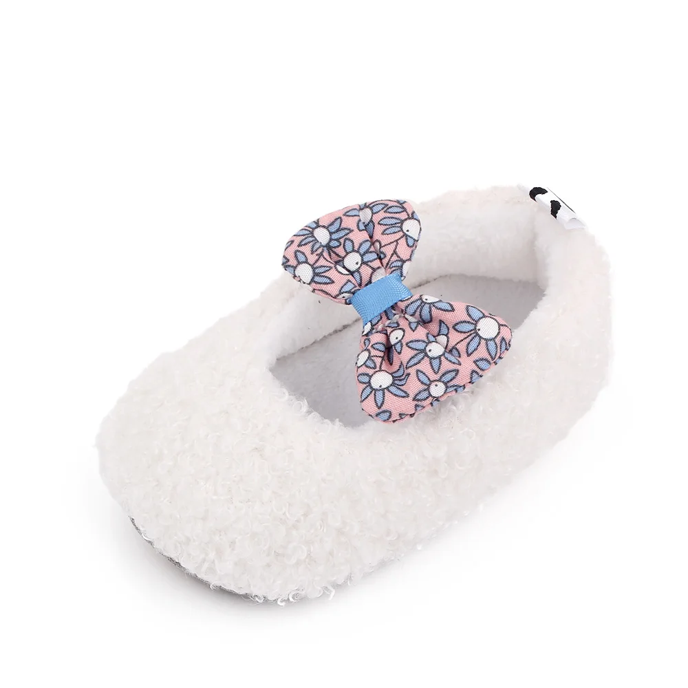 Autumn and Winter 0-1 Year Old Baby Solid Color Fluffy Cute Bow Warm Soft Soled Cotton Shoes factory