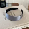 grey wide-brimmed headband