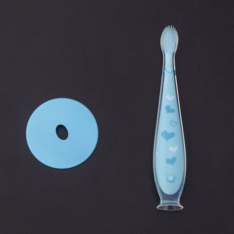OEM цветной защитный блок, предотвращающий проглатывание, синяя ручка, стоячая всасывающая детская силиконовая зубная щетка