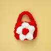 White flowers-red bag