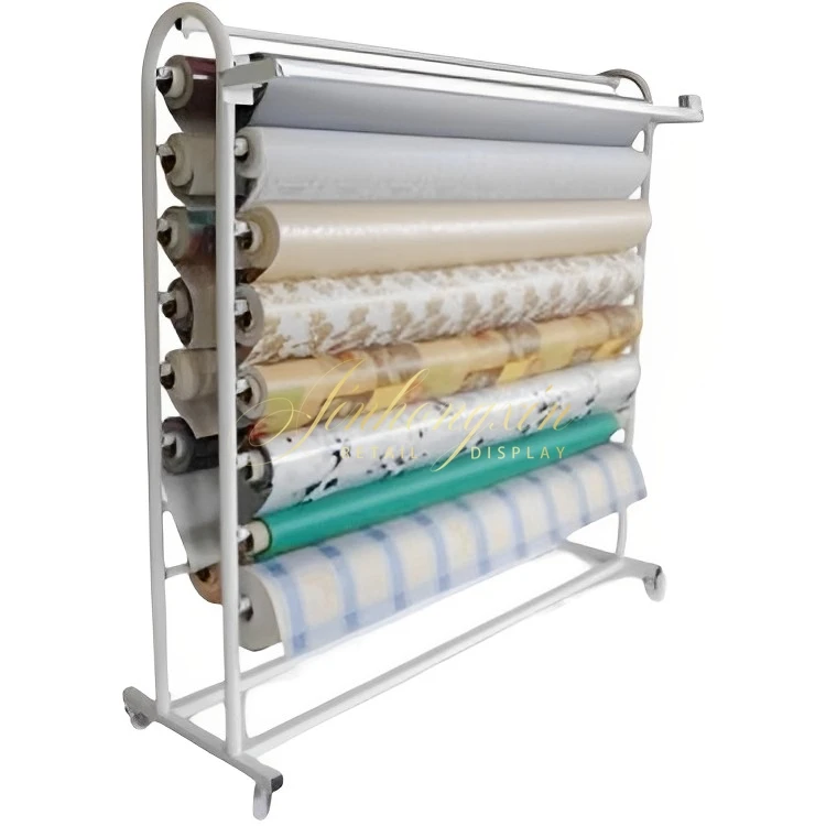 Стендом ткани. Интерьер магазина штор. Текстильная выставка. Текстильная выставка стенды. Магазин тканей интерьер.