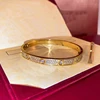 3 file con diamante principale in oro