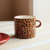 Tasse droite imprimé léopard, calibre 9 cm x 9 cm.