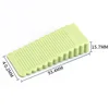 Small green triangular door stop