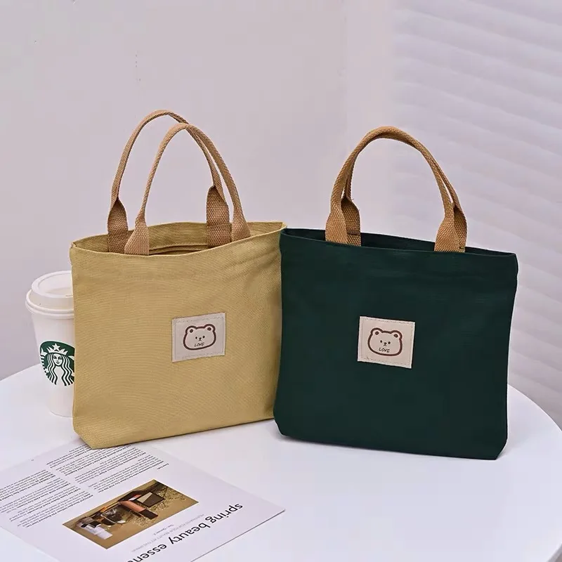 Canvas bag female 2023 new autumn simple small cloth bag office worker commuting bag Japanese go out handbag