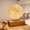 light wood base with levitating moon