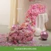 Cascada de flores para mesa en estilo AM, rosa y blanco.