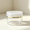 Transparent bottle with transparent lid and gold line