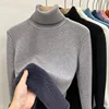 Chaqueta polar con cuello alto gris