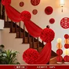 30 large red flowers and 4 eight-meter-long ribbons