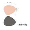 Pink and dark gray coasters