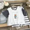 Orso con maniche a spalla bassa