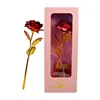 Pink boxed red roses