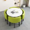 Imitation marble round table + light green leather chairs
