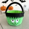 Secchiello per caramelle verde Frankenstein con frange nere