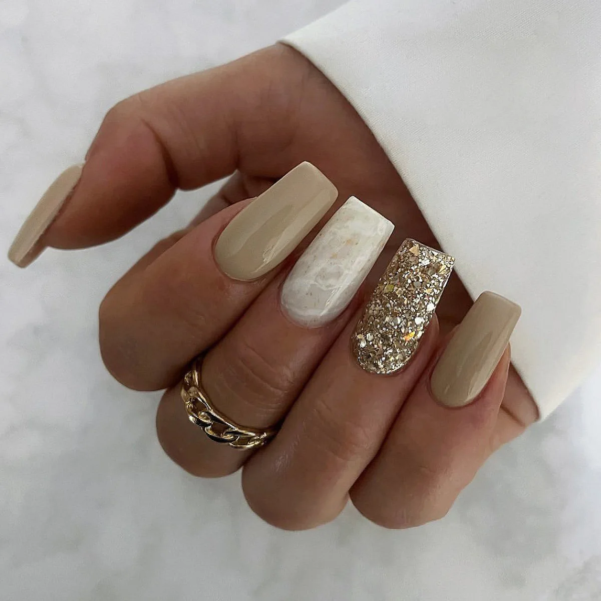 Golden Glamour: Engagement Nails with Sparkle