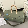 Bolso graffiti verde