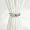 Silver diamond-studded belt buckle