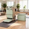 Pilates plegable de roble verde.