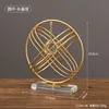 Ornamento con sfera di cristallo ad anello