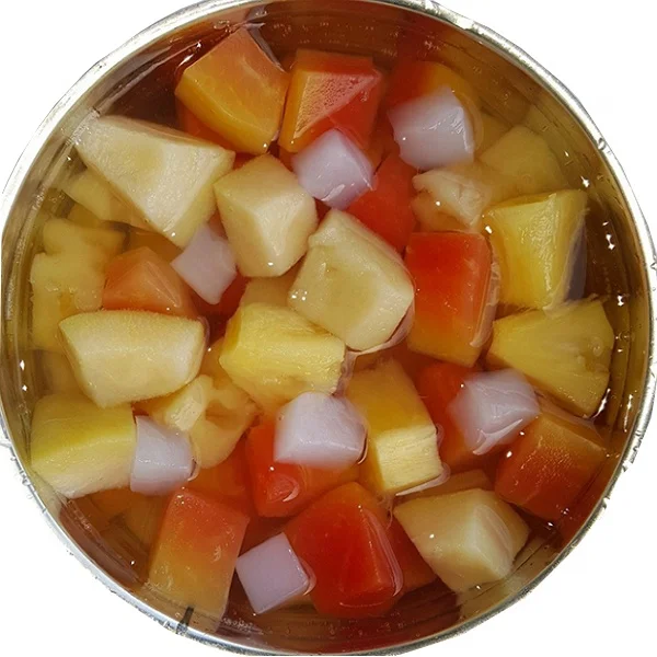 Canned tropical fruit cocktail in passion fruit juice