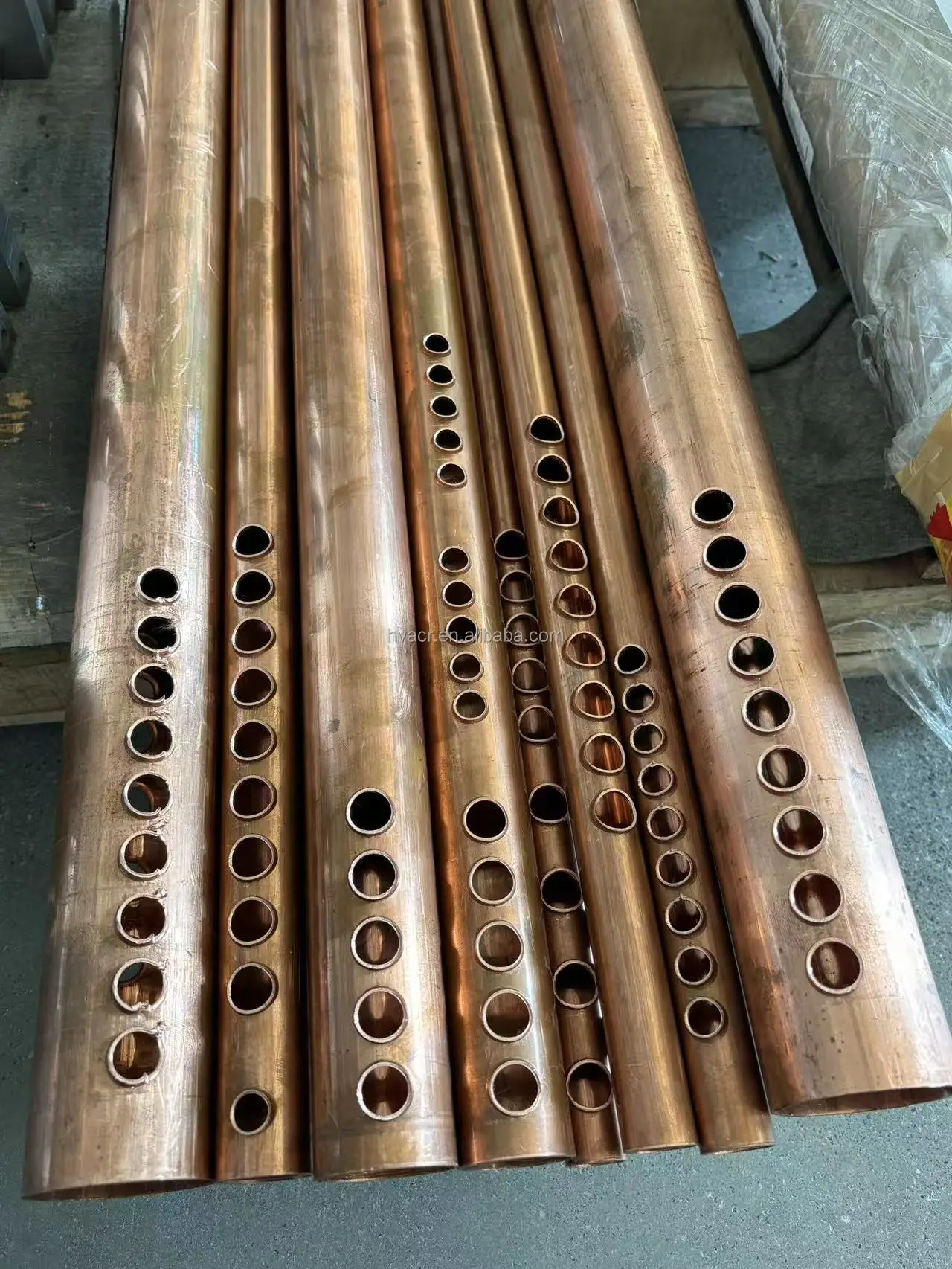 BOBO Machine copper tube hole pipe punching machine for solar shown in a detail photo for this news article