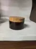 amber plastic jar with plastic wood grain lid