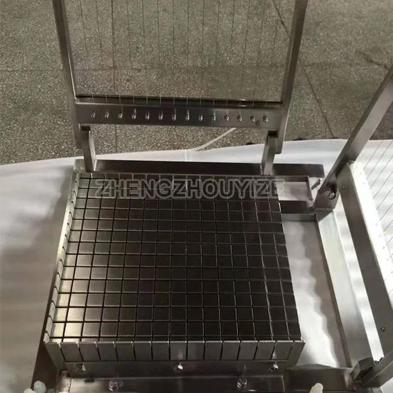 Manual Double Cutting Arm Chocolate Bar Square Grid Cake Cutting Machine  Caramel Cutter Chocolate Guitar Cutter - China Chocolate Cutting Machine,  Chocolate Slicing Machine