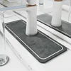 Diatomaceous earth faucet pad - dark gray striped frame