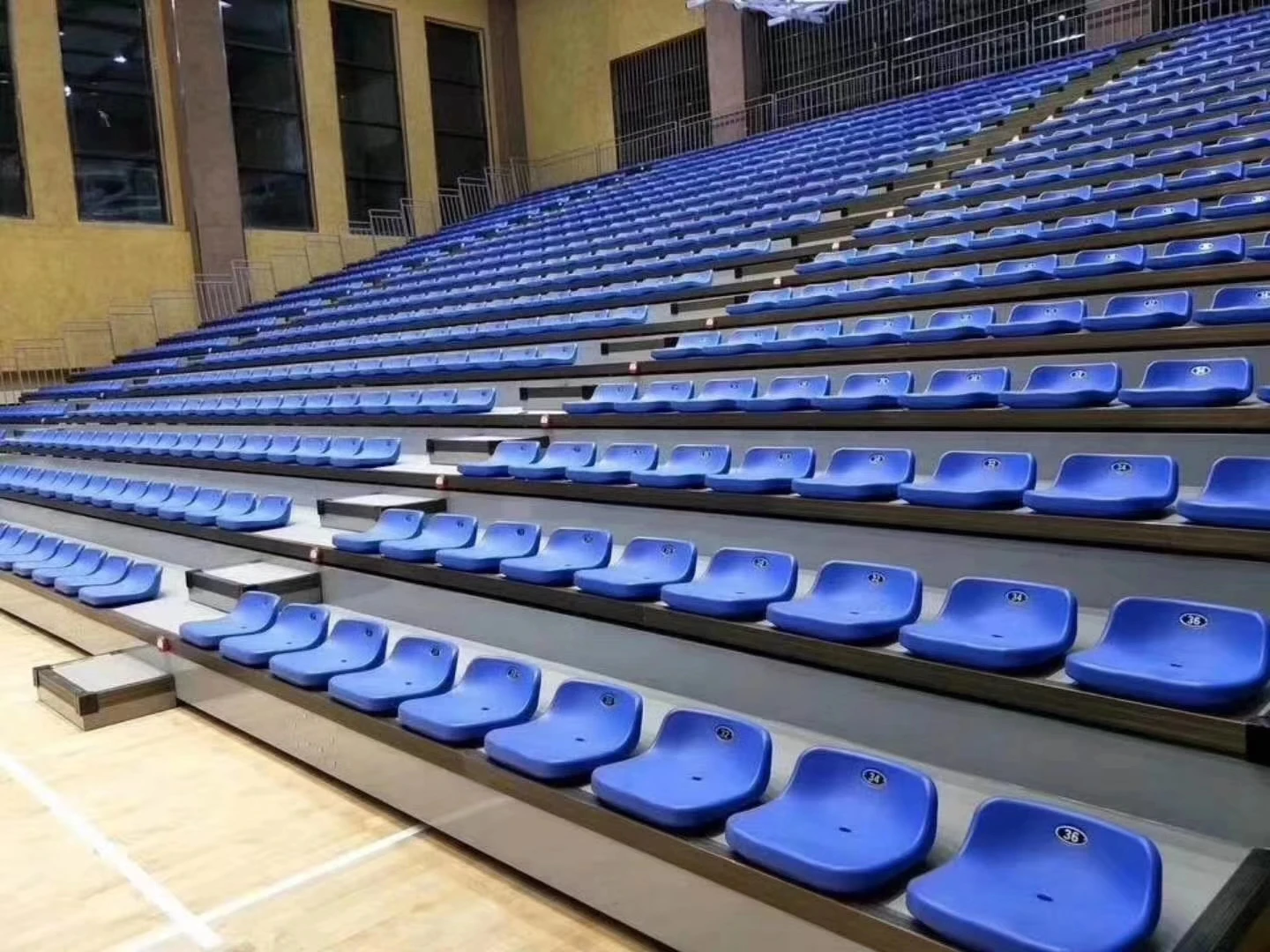 Best Selling Movable  stadium retractable bleachers 12 people ,16 people ,24 people Athletics Field sports stand