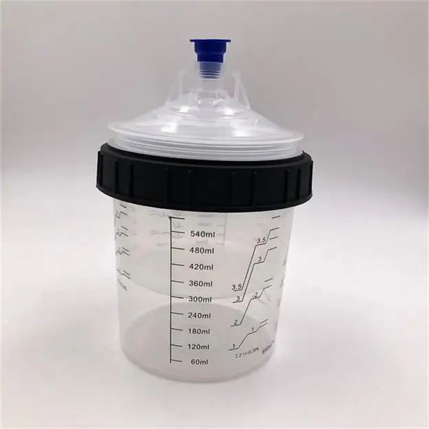 Plastic paint mixing measuring cup