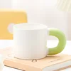 Matte white and green handle