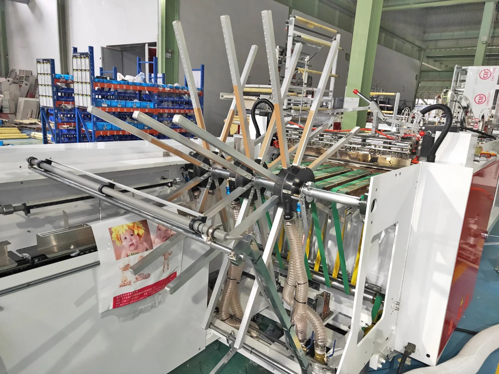 Automatic high speed punching handle Wicket Diaper plastic Bag Making Machine