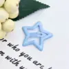 Clip estrella gota de aceite color 3.2cm azul barbie