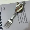 brown1 Striped Cat-eye Snail fork