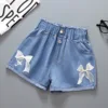 Pantaloncini elasticizzati con grande farfalla