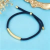 Ciondolo in oro+cordone blu navy