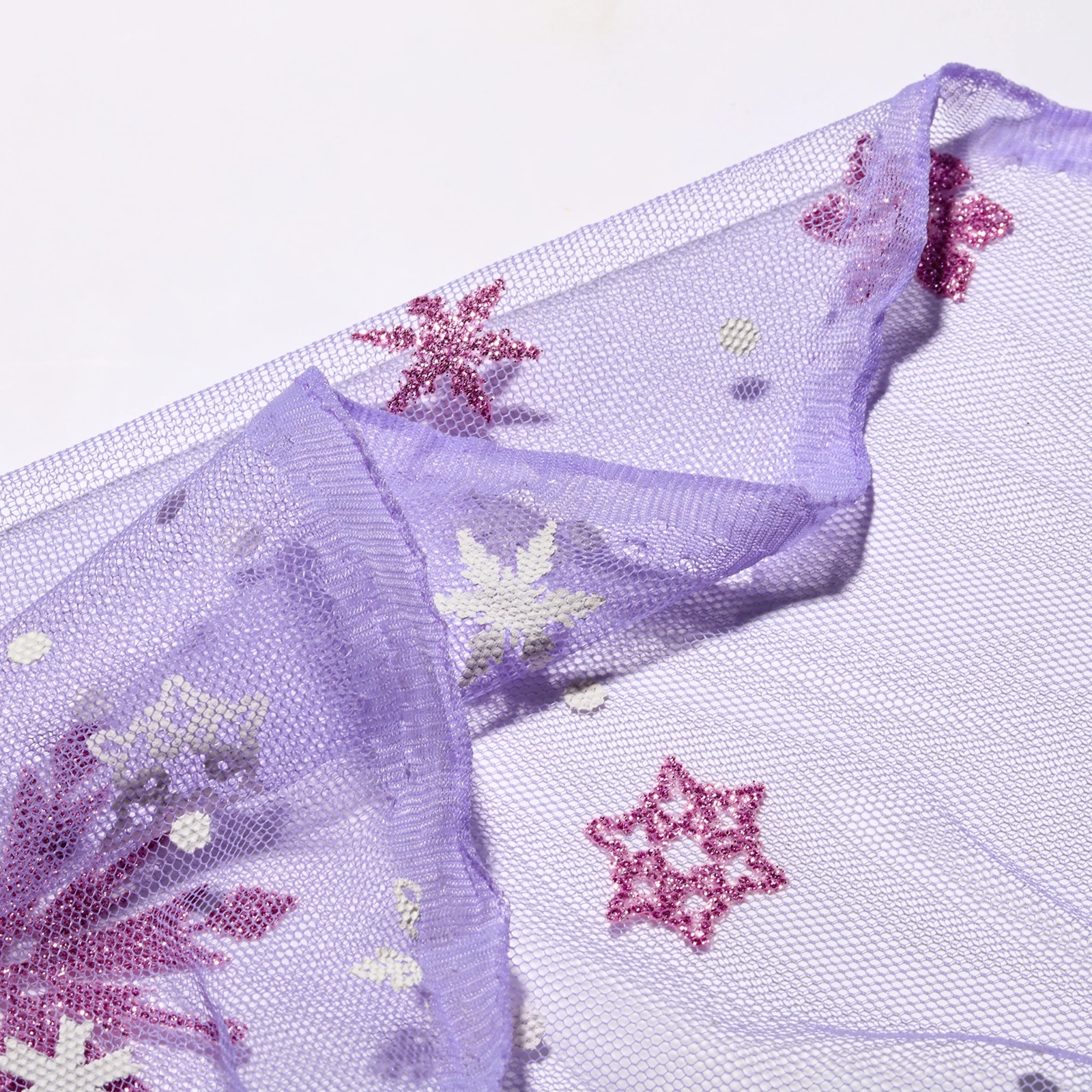 Hot sale high quality nice design purple snowflake printed tulle mesh fabric for wedding dress ect
