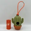 Dispensador + goma naranja + 1 rollo de bolsas