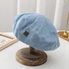 Light blue-c metal label
