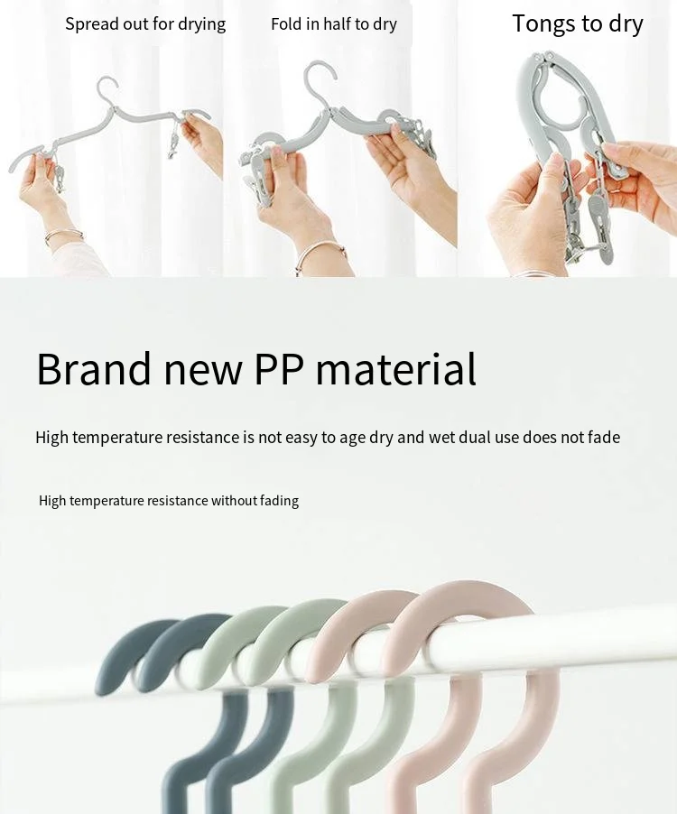 Travel mini portable travel hangers dormitory multi-functional hangers travel folding hangers storage device supplier