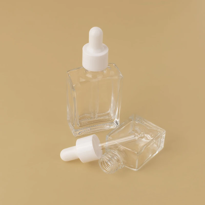 Luxury custom square cosmetic clear 15ml 30ml 50ml 100ml face hair glass serum essential oil dropper bottle manufacture