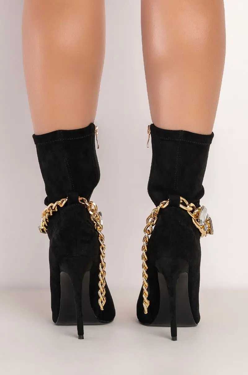 high heel boots with chains