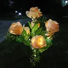 Bolsa amarilla con 7 cabezas de rosas.