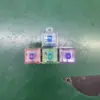 Colorato a forma di T con quattro bottoni